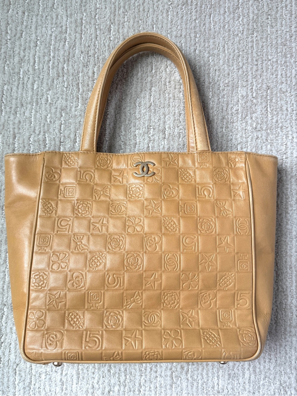 Vintage Chanel Precious Symbols Embossed Lambskin Tote Beige